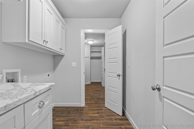 21893 S Arlene Dr, Claremore, OK 74019 - washroom featuring baseboards, cabinet space, dark wood-style floors, hookup for a washing machine, and hookup for an electric dryer