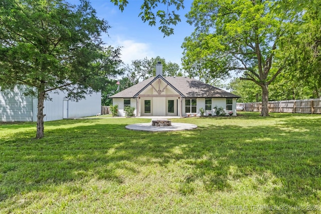21893 S Arlene Dr, Claremore, OK 74019 - rear view of house featuring a fire pit and a chimney