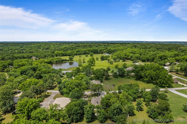 21893 S Arlene Dr, Claremore, OK 74019 - drone / aerial view of a heavily wooded area and a nearby body of water
