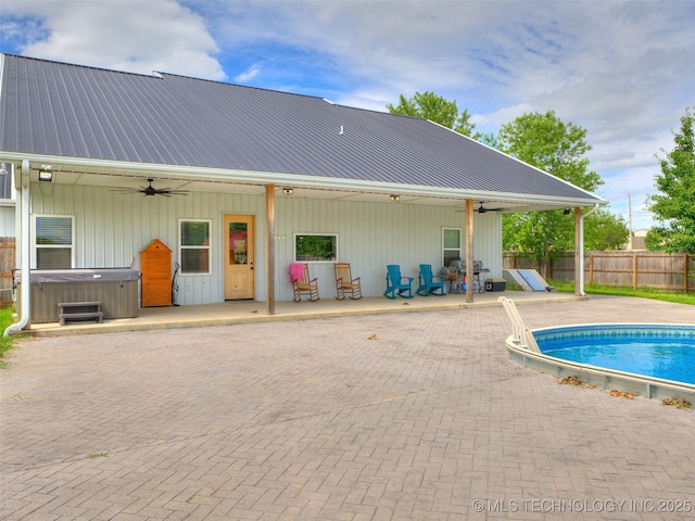 23814 E 91st St S, Broken Arrow, OK 74014 - view of pool featuring ceiling fan, a patio, and a hot tub