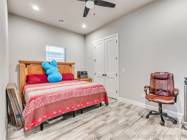 23814 E 91st St S, Broken Arrow, OK 74014 - bedroom with wood finished floors, baseboards, recessed lighting, a ceiling fan, and a closet