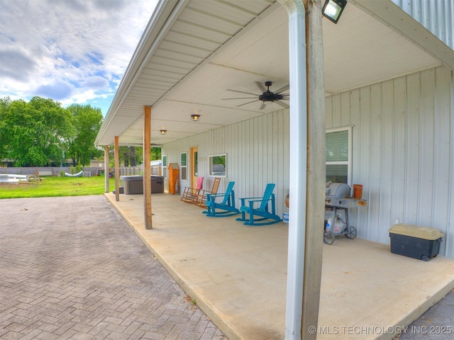 23814 E 91st St S, Broken Arrow, OK 74014 - view of patio / terrace with ceiling fan and a hot tub