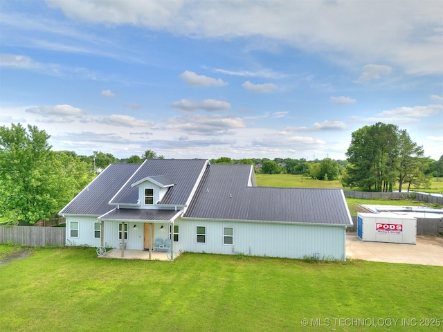23814 E 91st St S, Broken Arrow, OK 74014 - rear view of house featuring metal roof