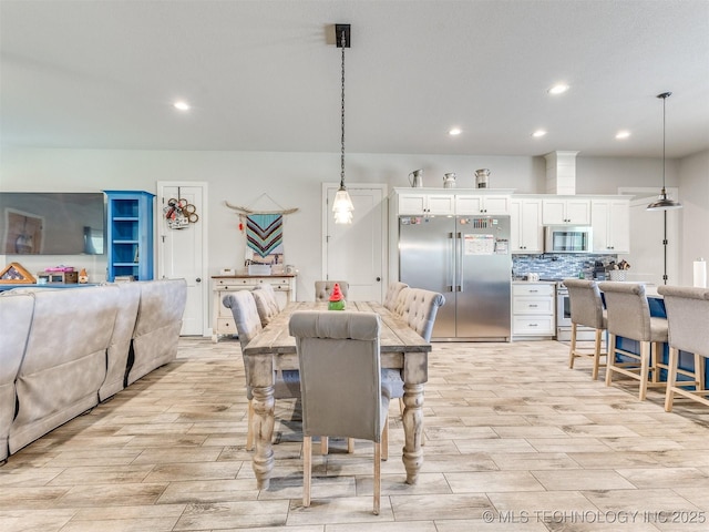 23814 E 91st St S, Broken Arrow, OK 74014 - dining room featuring light wood-style floors and recessed lighting