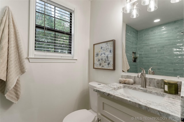 4514 S Quaker Ave, Tulsa, OK 74105 - full bath with vanity, toilet, and tiled shower