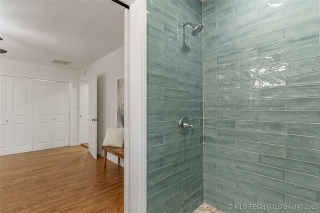 4514 S Quaker Ave, Tulsa, OK 74105 - full bath with a tile shower and wood finished floors
