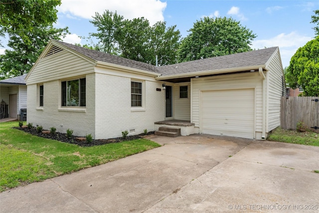 4514 S Quaker Ave, Tulsa, OK 74105 - ranch-style house with brick siding, an attached garage, crawl space, driveway, and a shingled roof