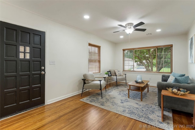 4514 S Quaker Ave, Tulsa, OK 74105 - living room featuring wood finished floors, a ceiling fan, recessed lighting, and baseboards