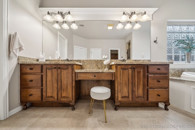7734 S Indian Ave, Tulsa, OK 74132 - full bathroom with vanity, a chandelier, and tile patterned flooring