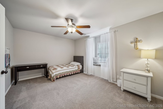 7734 S Indian Ave, Tulsa, OK 74132 - carpeted bedroom featuring a ceiling fan and baseboards
