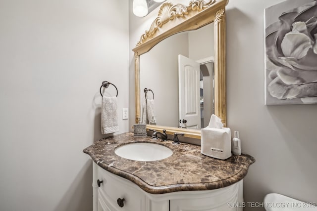7734 S Indian Ave, Tulsa, OK 74132 - bathroom with vanity and toilet