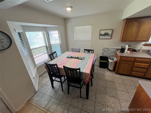 1700 S Cypress Ave, Broken Arrow, OK 74012 - dining room featuring light tile patterned floors