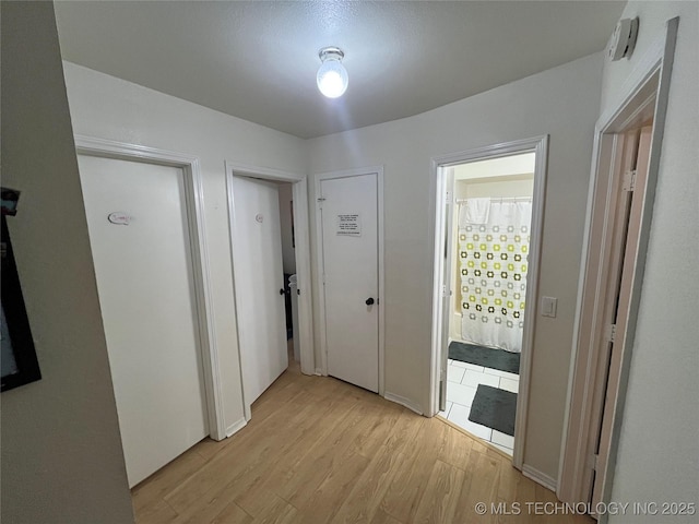 1700 S Cypress Ave, Broken Arrow, OK 74012 - hall featuring light wood finished floors