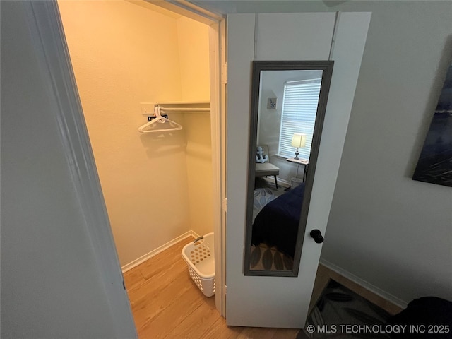 1700 S Cypress Ave, Broken Arrow, OK 74012 - bathroom with wood finished floors and baseboards