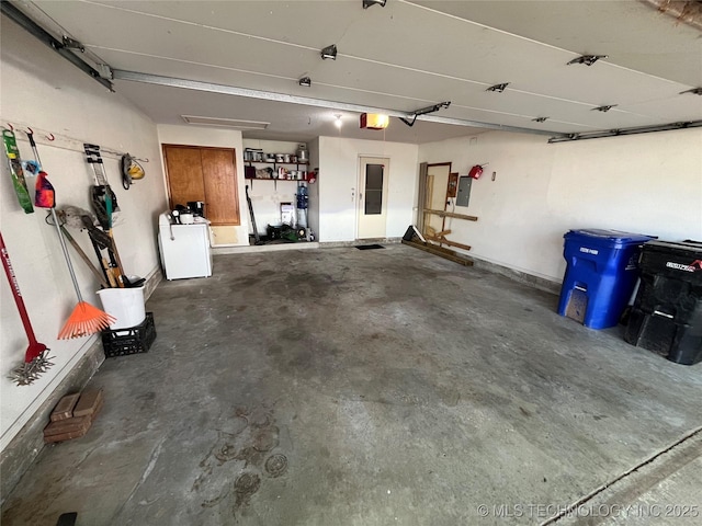 1700 S Cypress Ave, Broken Arrow, OK 74012 - garage with a garage door opener, washer / dryer, and electric panel