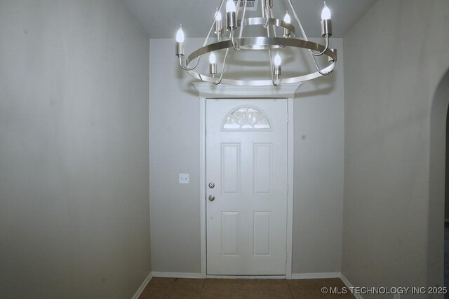 15310 E 89th Pl, Owasso, OK 74055 - tiled entryway featuring a chandelier and baseboards