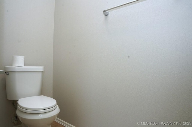 15310 E 89th Pl, Owasso, OK 74055 - bathroom with toilet and baseboards