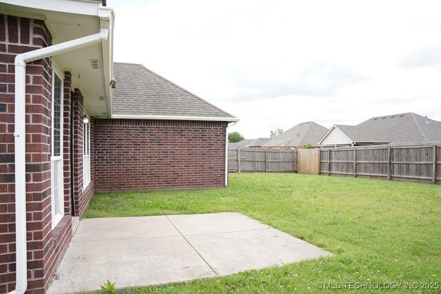 15310 E 89th Pl, Owasso, OK 74055 - view of yard with a patio