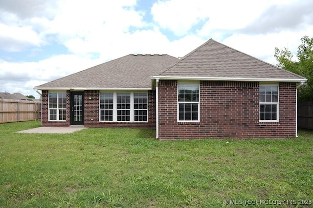 15310 E 89th Pl, Owasso, OK 74055 - rear view of property featuring brick siding, a shingled roof, and a patio