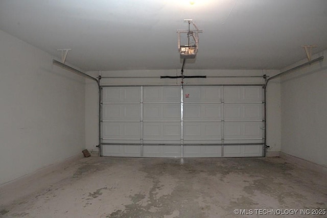 15310 E 89th Pl, Owasso, OK 74055 - garage featuring a garage door opener