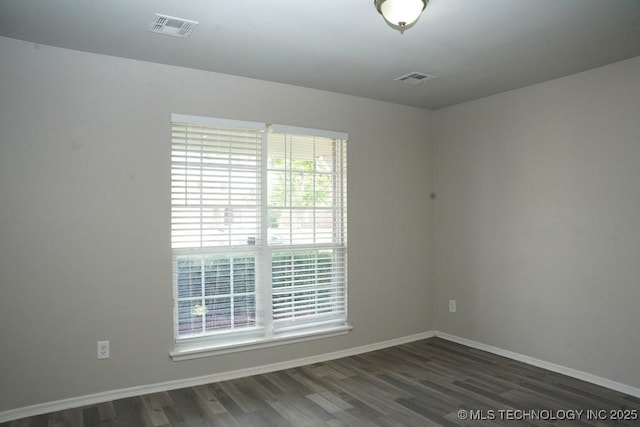 15310 E 89th Pl, Owasso, OK 74055 - empty room with baseboards and wood finished floors