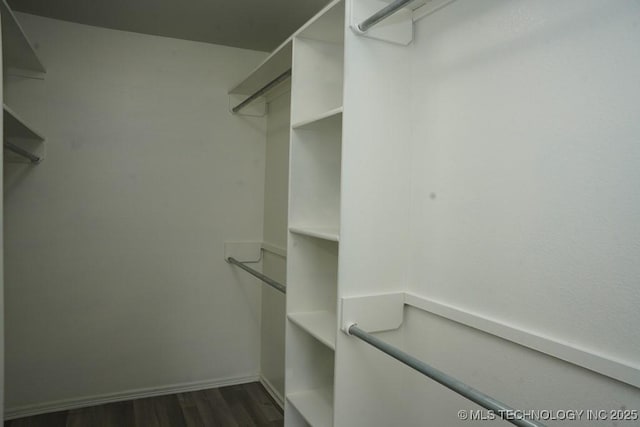 15310 E 89th Pl, Owasso, OK 74055 - spacious closet featuring dark wood finished floors
