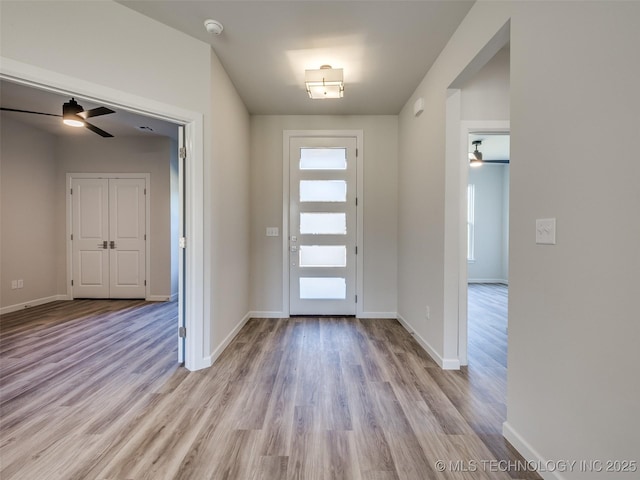 3011 S 6th Pl, Broken Arrow, OK 74012 - entrance foyer featuring a ceiling fan, light wood finished floors, and baseboards
