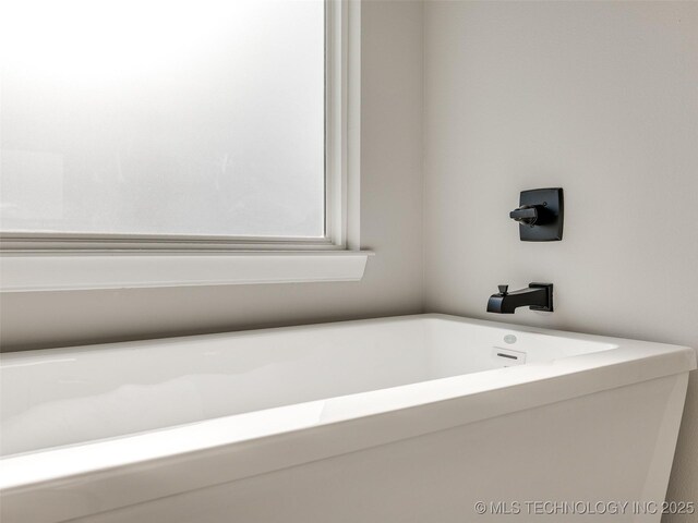 3011 S 6th Pl, Broken Arrow, OK 74012 - bathroom with a tub to relax in
