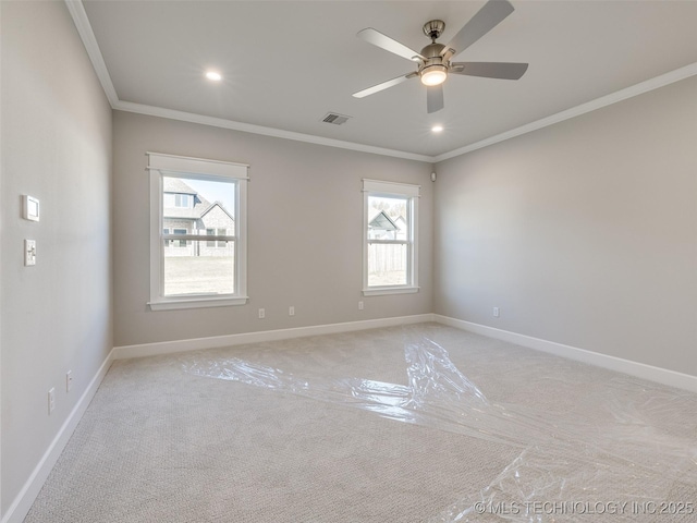 4010 W Baton Rouge St, Broken Arrow, OK 74011 - empty room with crown molding, light colored carpet, plenty of natural light, baseboards, and ceiling fan