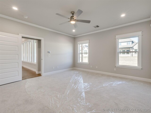 4010 W Baton Rouge St, Broken Arrow, OK 74011 - spare room featuring light colored carpet, crown molding, ceiling fan, baseboards, and recessed lighting