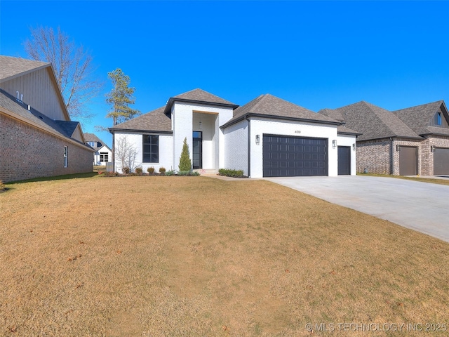 4010 W Baton Rouge St, Broken Arrow, OK 74011 - view of front of home featuring an attached garage, driveway, a front yard, and a shingled roof