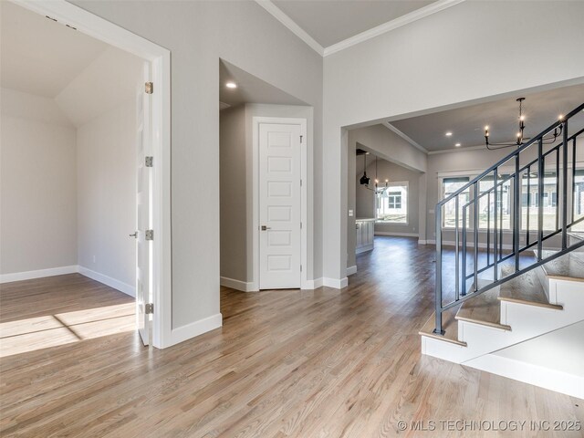 4010 W Baton Rouge St, Broken Arrow, OK 74011 - staircase featuring a chandelier, crown molding, baseboards, and wood finished floors