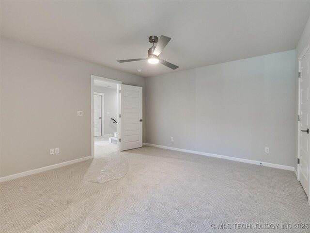 4010 W Baton Rouge St, Broken Arrow, OK 74011 - unfurnished room with a ceiling fan, light carpet, and baseboards