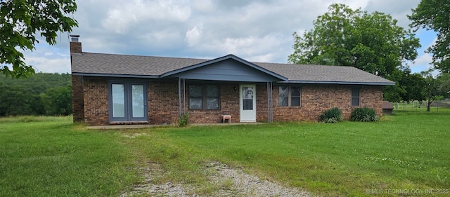 464877 E 1060th Rd, Sallisaw, OK 74955 - single story home with a front yard, a chimney, brick siding, and roof with shingles
