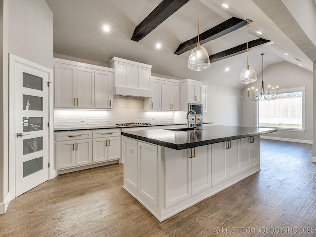 11220 S Fir Ave W, Jenks, OK 74037 - kitchen with a sink, tasteful backsplash, dark countertops, white cabinets, and recessed lighting