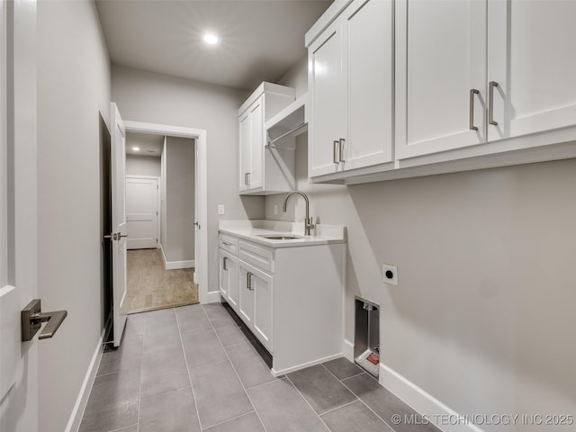 11220 S Fir Ave W, Jenks, OK 74037 - washroom with recessed lighting, electric dryer hookup, cabinet space, baseboards, and tile patterned floors