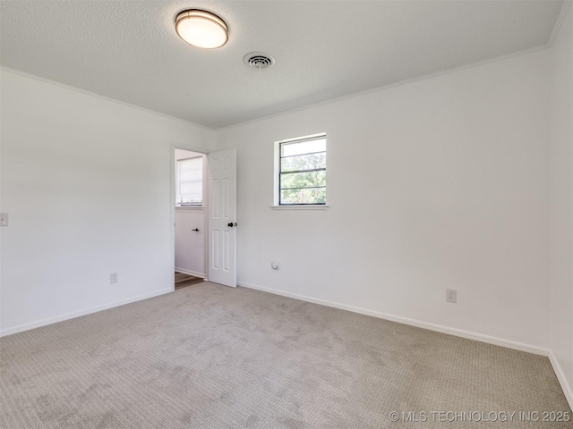 703 NE 8th St, Wagoner, OK 74467 - empty room featuring carpet floors and baseboards