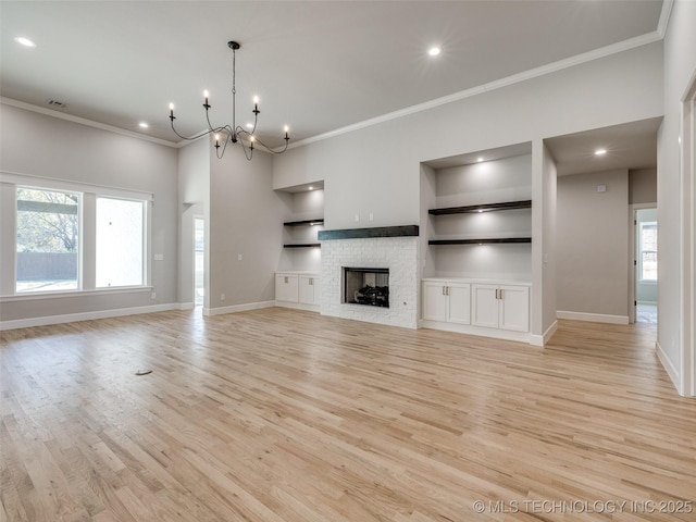 4011 W Baton Rouge St, Broken Arrow, OK 74011 - unfurnished living room with built in features, crown molding, baseboards, light wood-type flooring, and recessed lighting