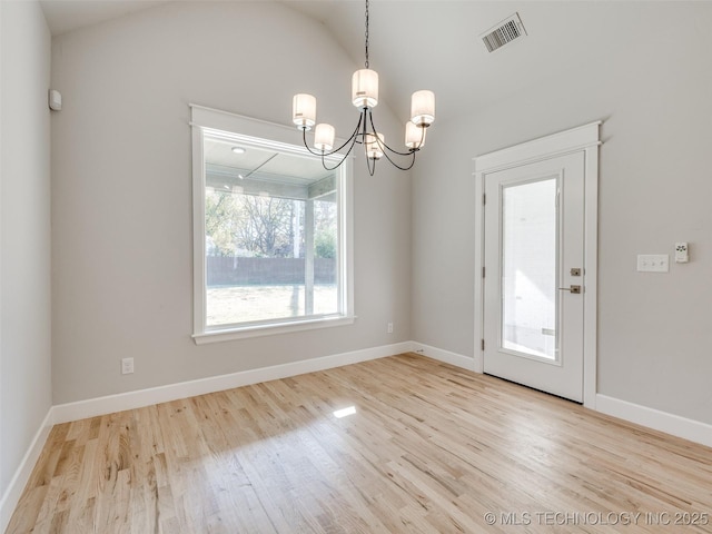 4011 W Baton Rouge St, Broken Arrow, OK 74011 - unfurnished room with a chandelier, wood finished floors, baseboards, and lofted ceiling