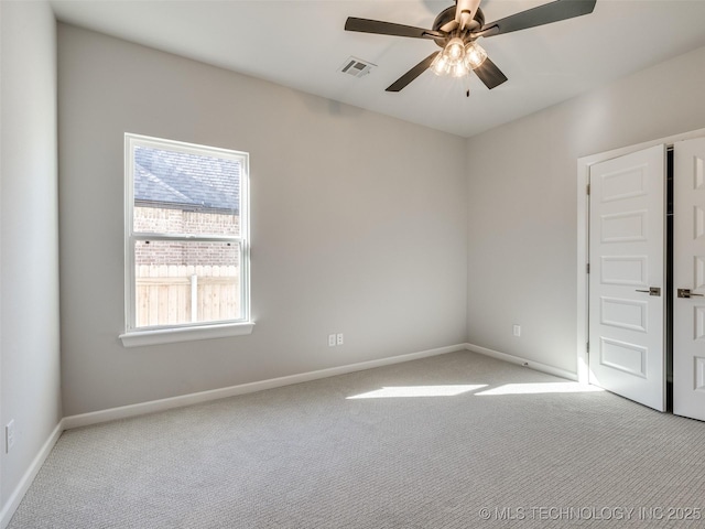 4011 W Baton Rouge St, Broken Arrow, OK 74011 - carpeted spare room featuring ceiling fan and baseboards