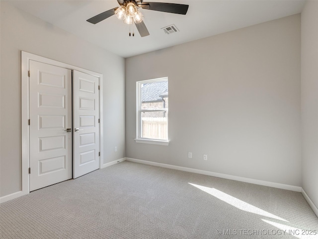 4011 W Baton Rouge St, Broken Arrow, OK 74011 - unfurnished bedroom featuring light colored carpet, baseboards, and a ceiling fan