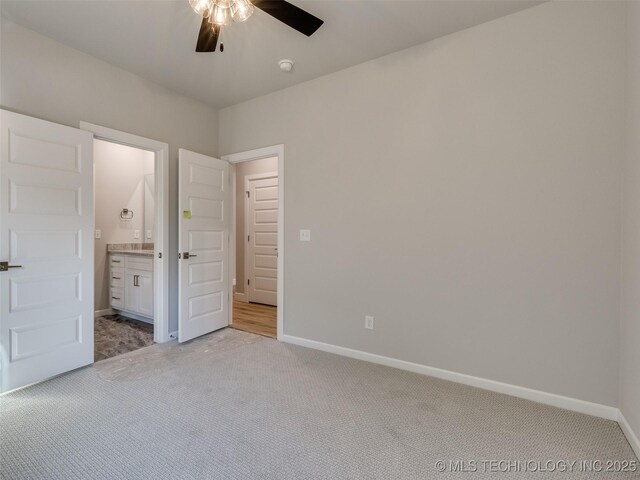 4011 W Baton Rouge St, Broken Arrow, OK 74011 - unfurnished bedroom with light carpet, baseboards, ensuite bathroom, and ceiling fan
