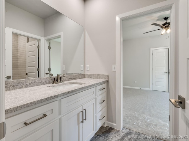 4011 W Baton Rouge St, Broken Arrow, OK 74011 - bathroom featuring a ceiling fan, vanity, and baseboards