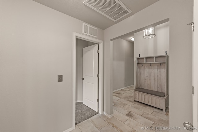 13010 E 122nd Pl, Collinsville, OK 74021 - mudroom with baseboards and light tile patterned flooring