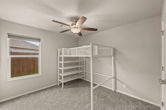 13010 E 122nd Pl, Collinsville, OK 74021 - unfurnished bedroom featuring carpet floors, baseboards, and a ceiling fan