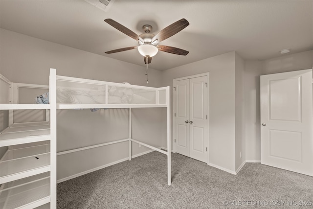 13010 E 122nd Pl, Collinsville, OK 74021 - unfurnished bedroom featuring carpet flooring, baseboards, and a ceiling fan