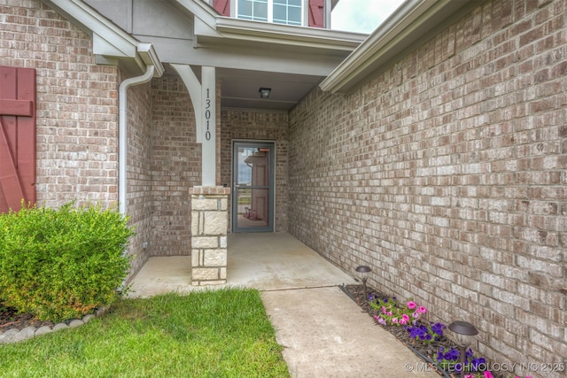 13010 E 122nd Pl, Collinsville, OK 74021 - property entrance with brick siding and a porch
