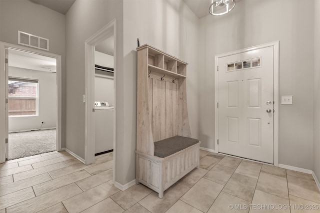 13010 E 122nd Pl, Collinsville, OK 74021 - mudroom with washer / clothes dryer and baseboards