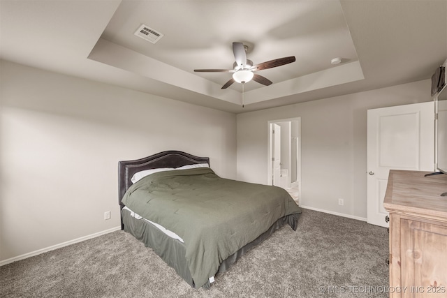 13010 E 122nd Pl, Collinsville, OK 74021 - bedroom featuring a tray ceiling, carpet flooring, baseboards, and ensuite bathroom