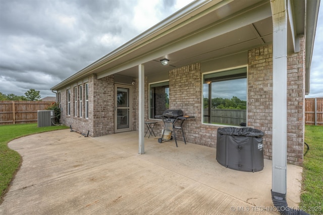 13010 E 122nd Pl, Collinsville, OK 74021 - view of patio with area for grilling and central AC unit